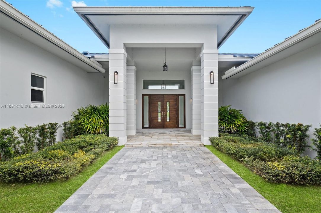 Porch and Front Entrance with Marble Tile and Pavers