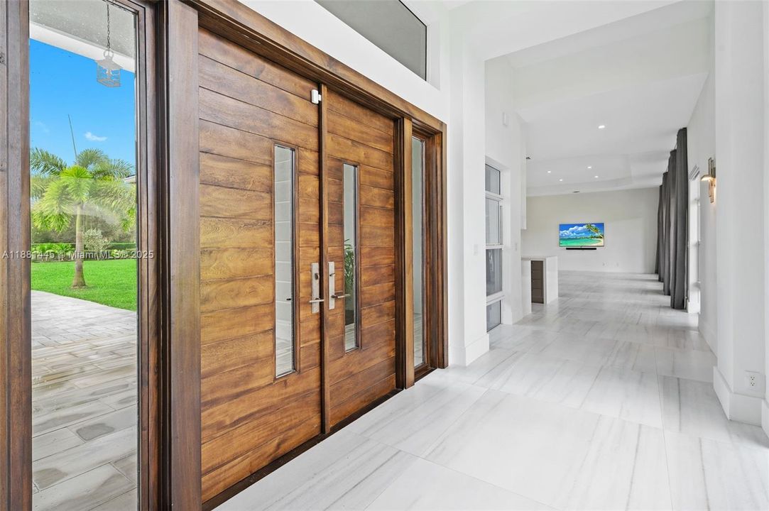 Grand Foyer with 12ft ceilings and 7ft wide hallway