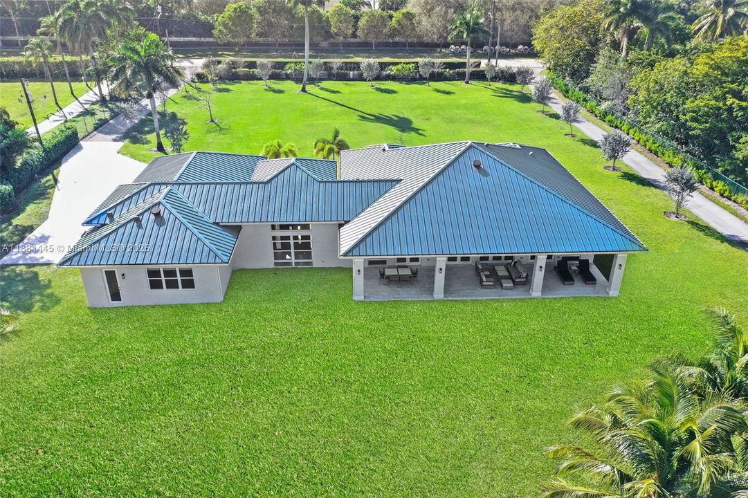 Sweeping green space—perfect canvas for a pool, pickleball or tennis courts, soccer field, or equestrian lifestyle