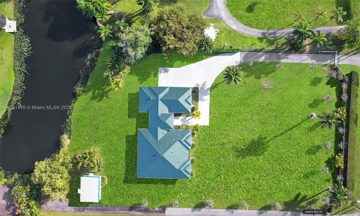 Private, gated 2-acre Estate with Lake