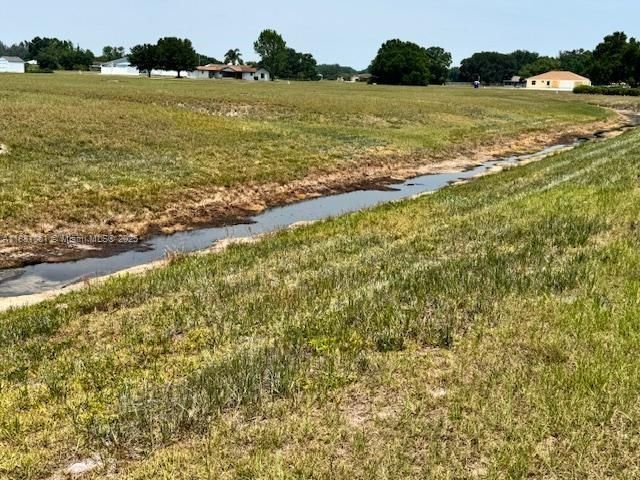 View of drainage canal at back of lot