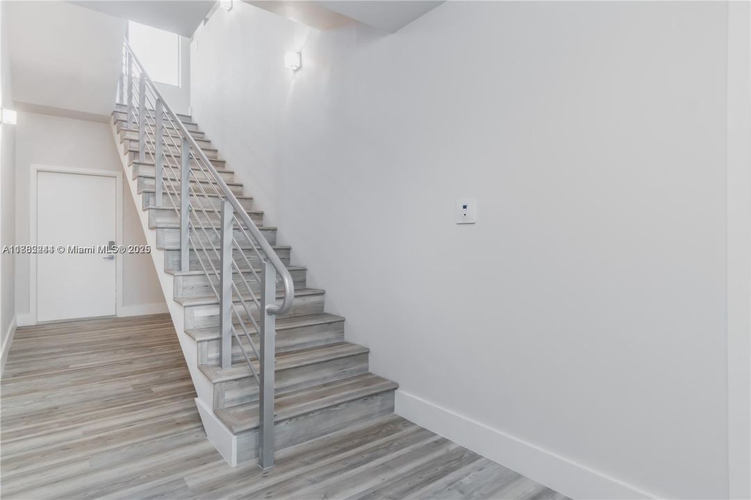 FIRST FLOOR ENTRY TO BED/OFFICE BATH