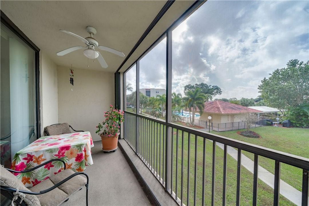 SCREENED BALCONY & POOL VIEW
