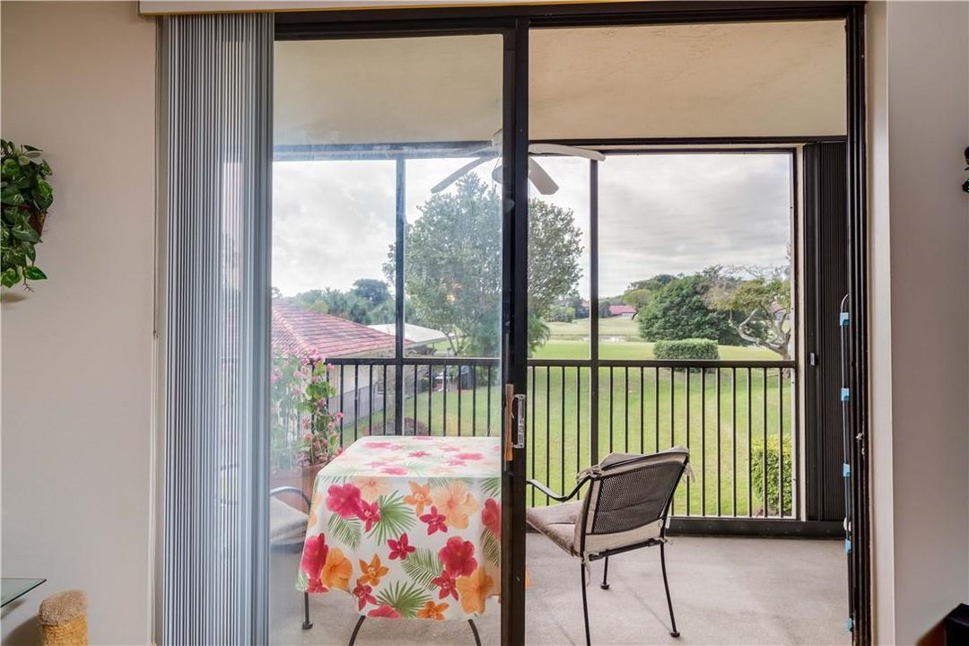 SCREENED BALCONY & GOLF COURSE VIEW