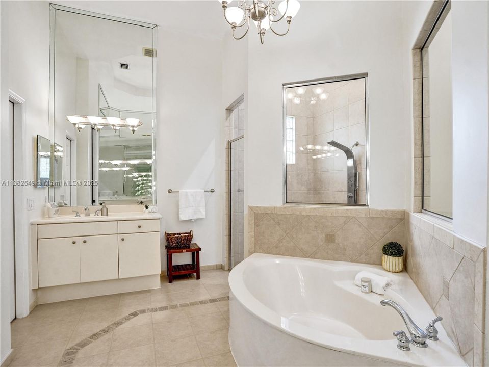 Freshly painted, large master bathroom with dual sinks