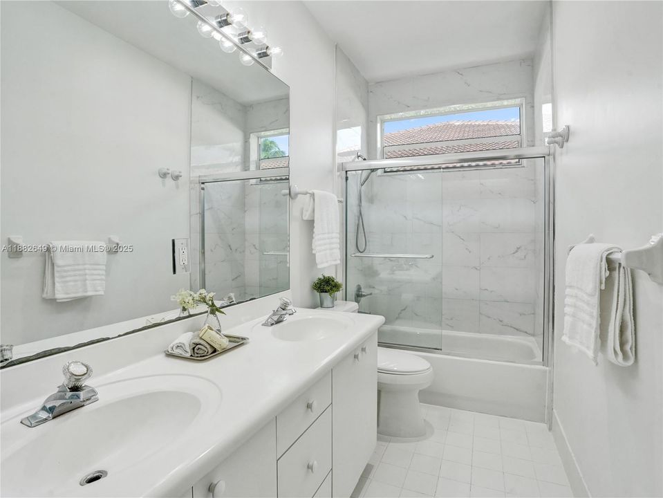 Light, bright and freshly painted modern bathroom