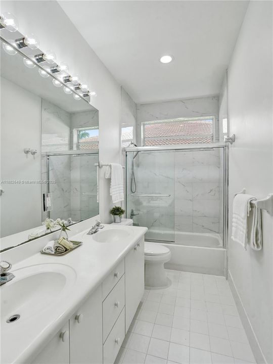Light, bright and freshly painted modern bathroom