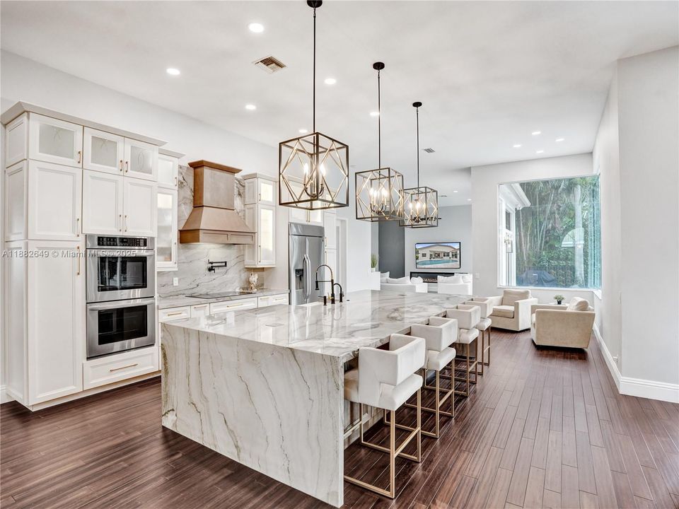 Thoughtfully remodeled showpiece kitchen at the heart of the home.