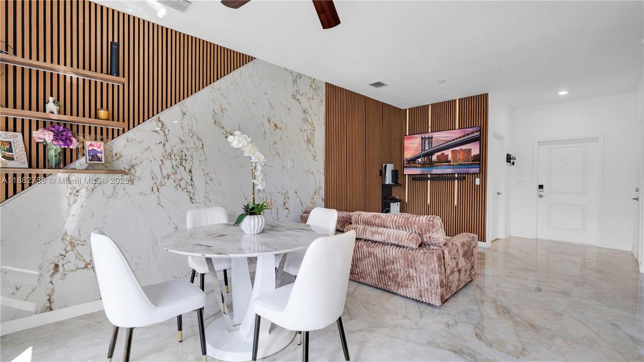 Upgraded porcelain tile flooring & LED-lit porcelain accent wall