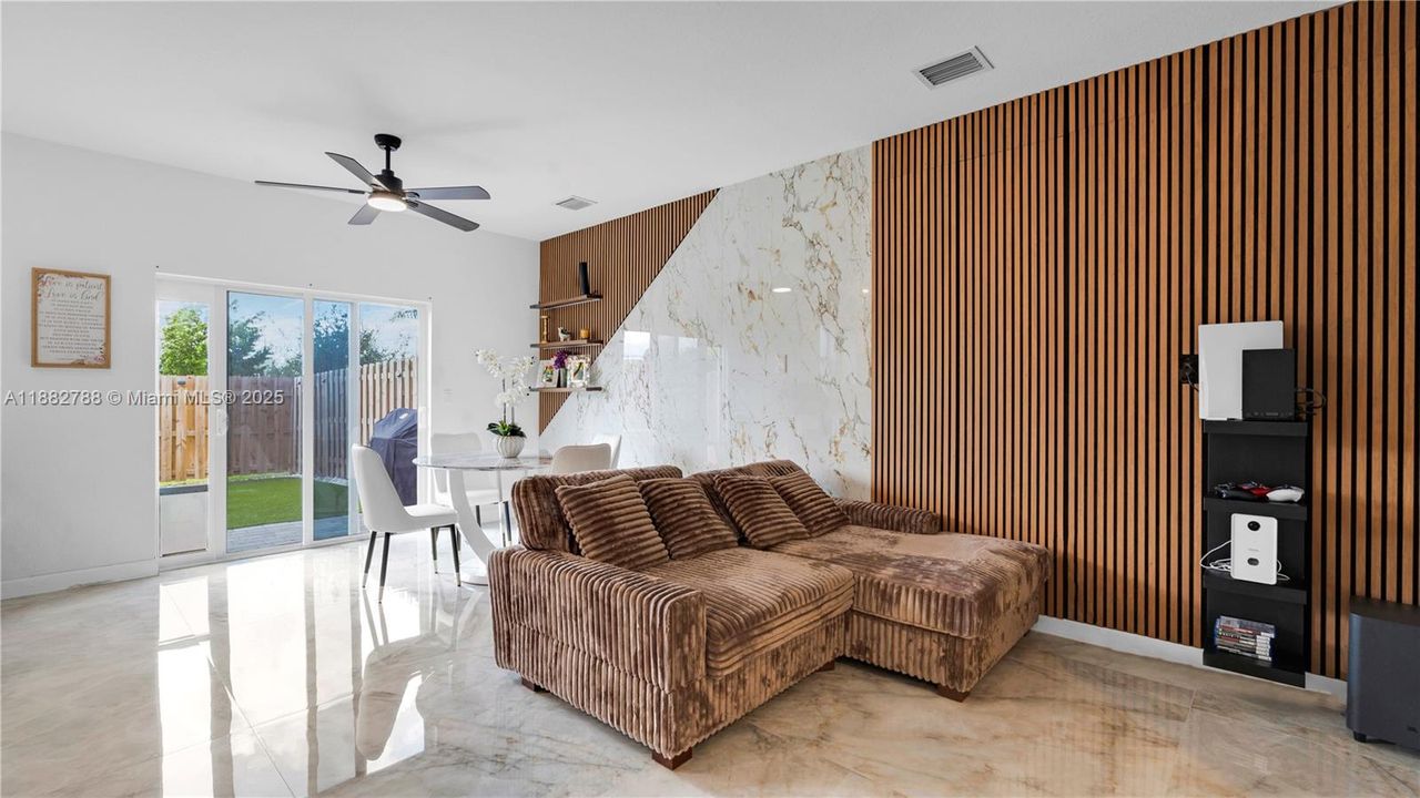 Upgraded porcelain tile flooring & LED-lit porcelain accent wall