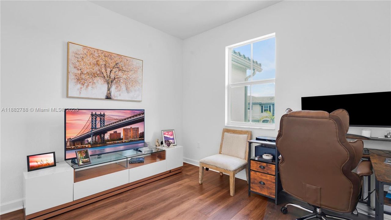 Upgraded vinyl wood flooring flows seamlessly throughout the entire upstairs, including the staircase.