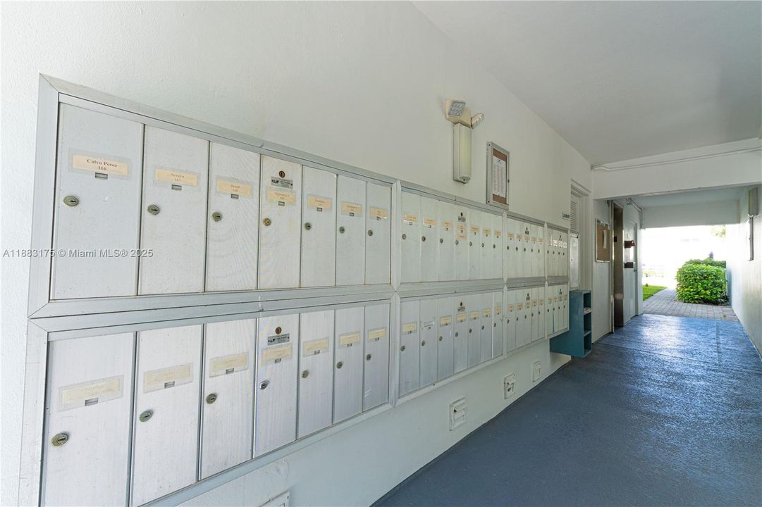 Mail room conveniently located two doors down from unit, next to laundry room.