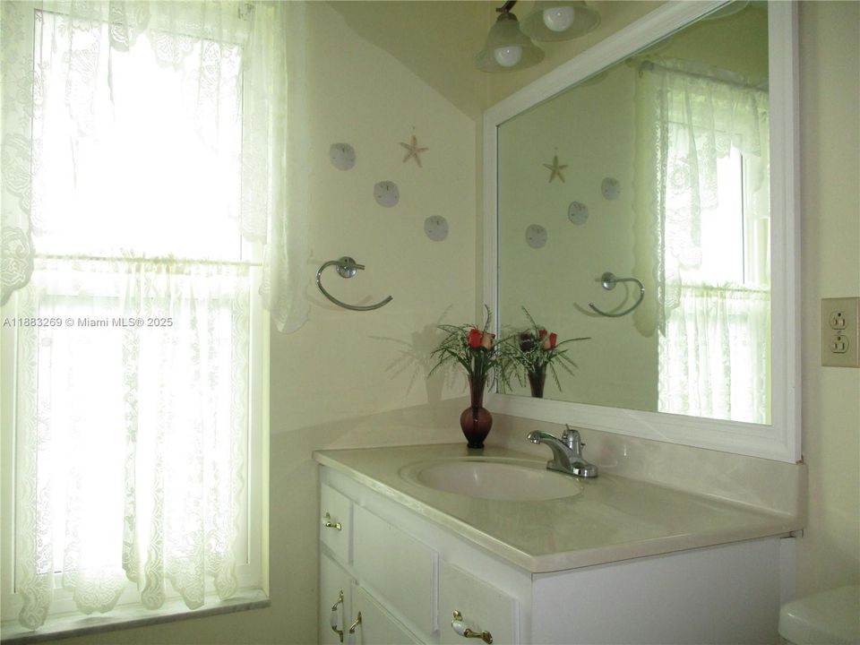 MASTER BATHROOM WITH FULL SIZE WINDOW