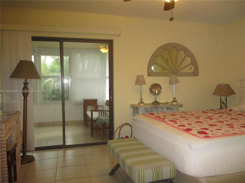 SLIDING GLASS DOOR TO PATIO FOR MORNING COFFEE