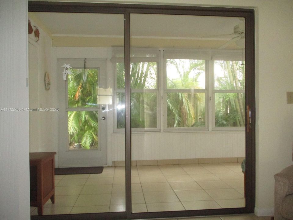 PRIVATE ENCLOSED PATIO WITH TROPICAL VIEW
