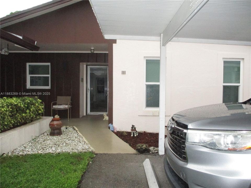 CARPORT PARKING FIRST SPACE ON RIGHT