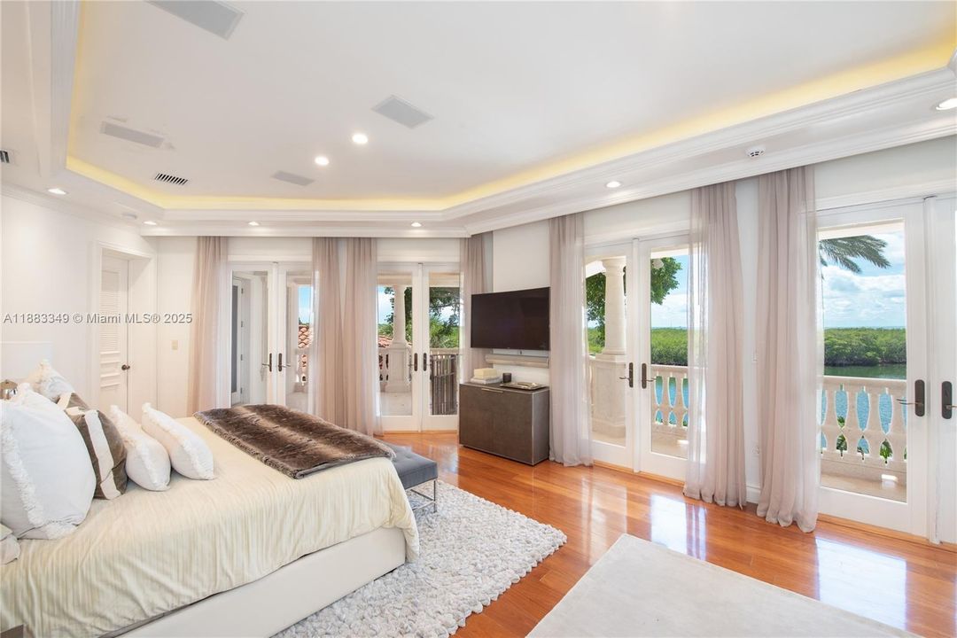 View from the primary bedroom, overlooking Pines Canal and Cape Florida State Park.