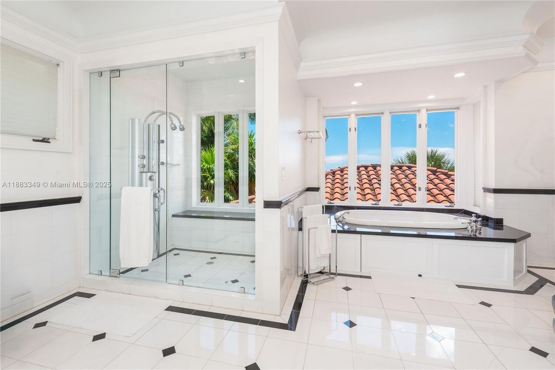 Spa like Primary Bathroom for your total relaxation and well-being.  A massage table can be easily incorporated