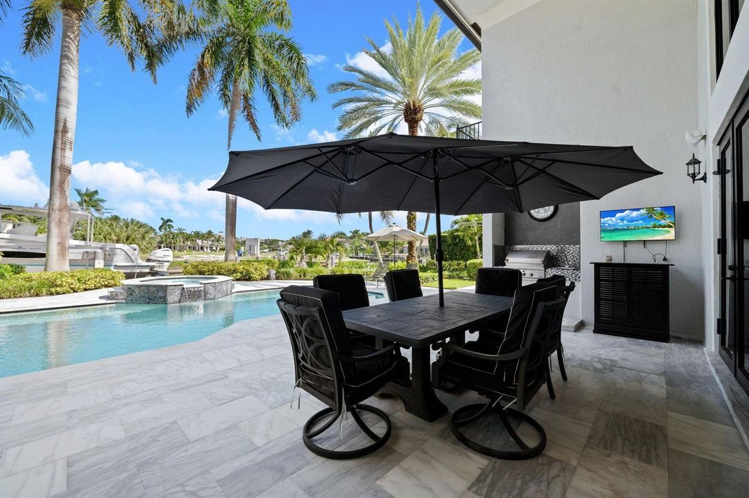 With outdoor kitchen