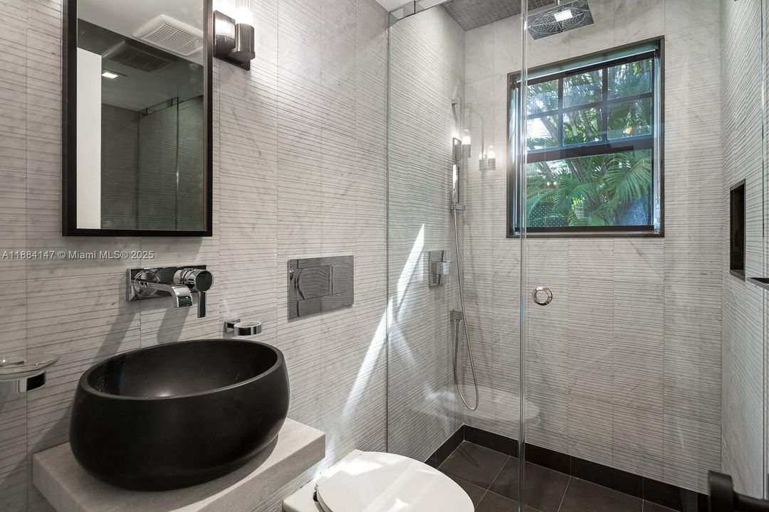 One of (2) full bathrooms on first floor, European hardware and chic finishes