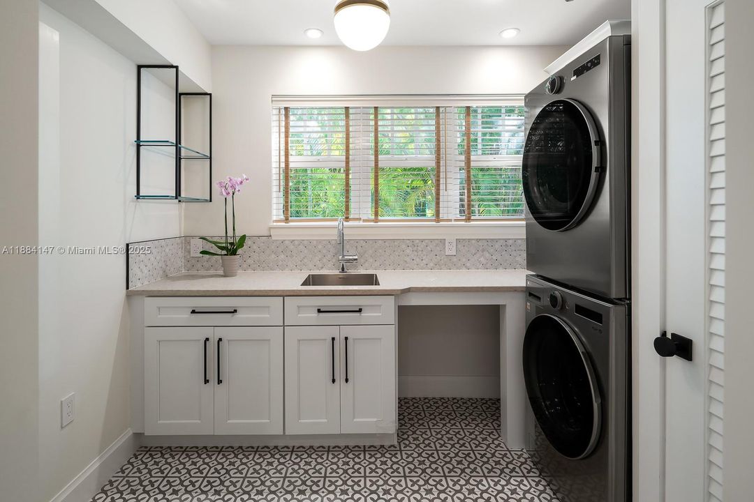 Laundry(or wet bar when entertaining)  area, with wall 'hideaway' ironing board