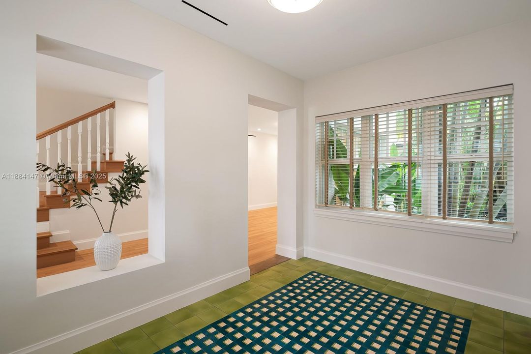 Impact windows throughout with blinds and fabric tape