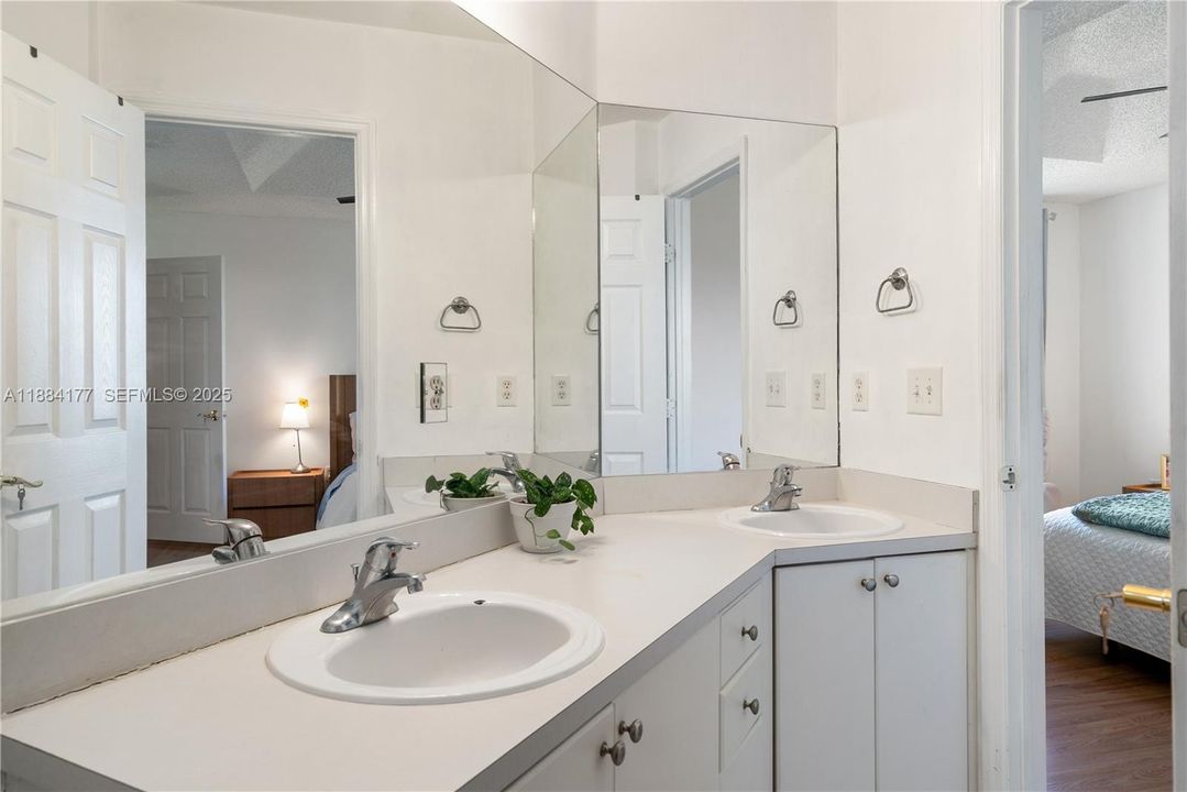 Master bathroom with  dual sinks.