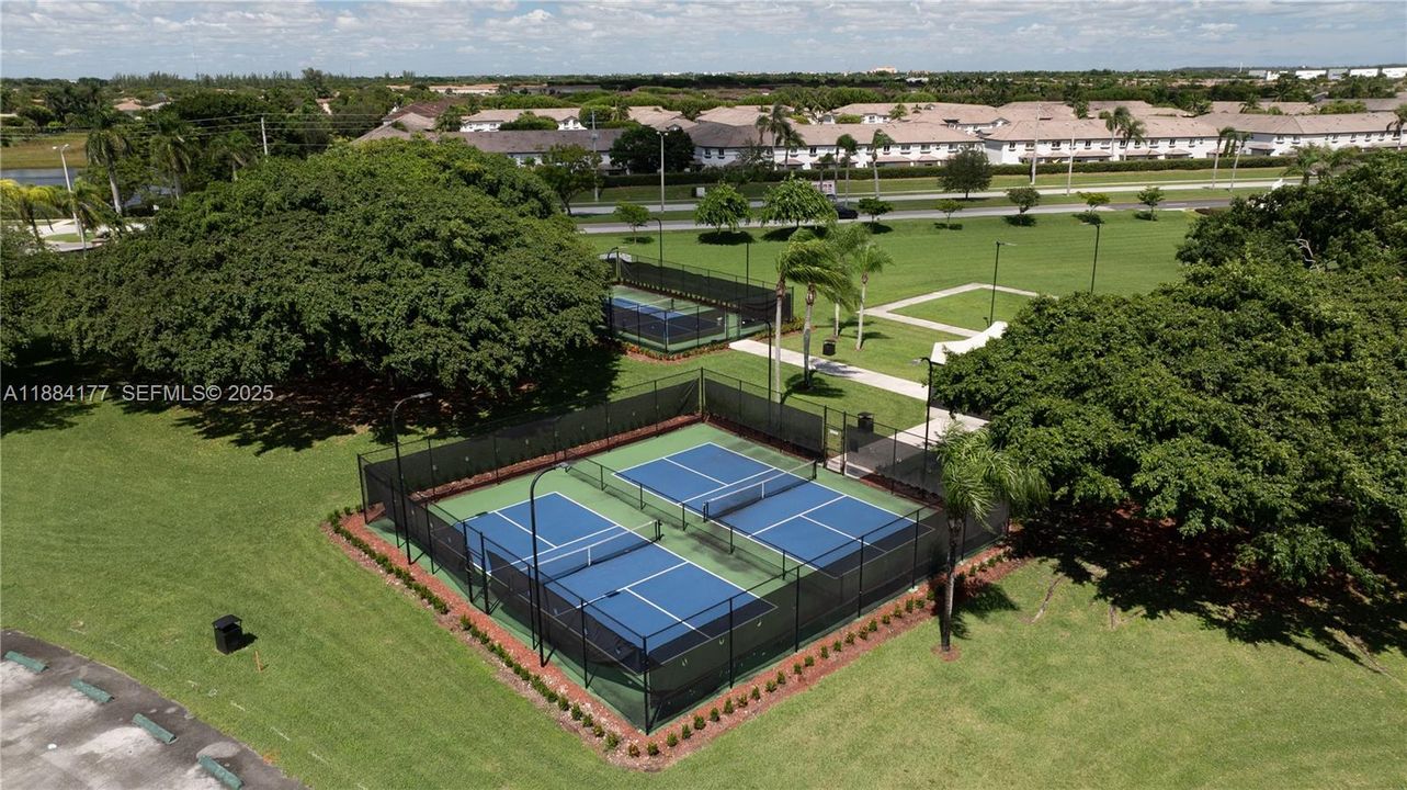 Enjoy tennis court access, covered by maintenance.