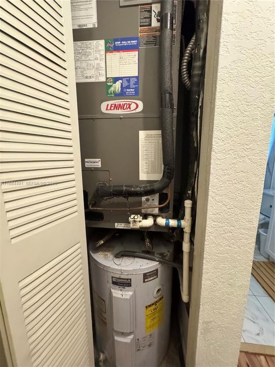 Air conditioner, hot water heater