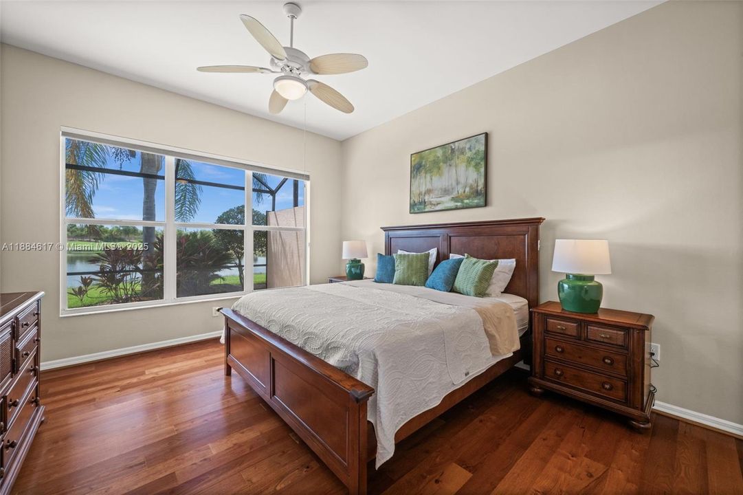 Spacious master bedroom with natural light