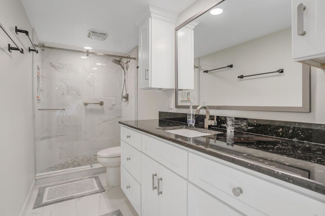 Primary Bath with glass enclosure
