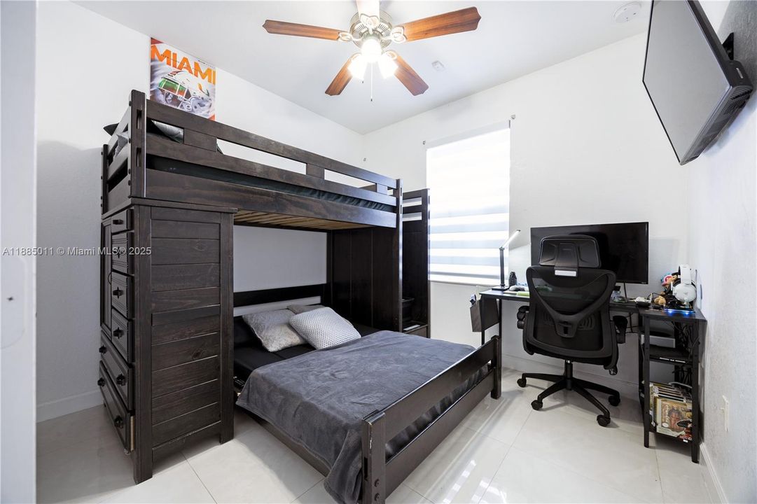 Bedroom with Zebra blinds.