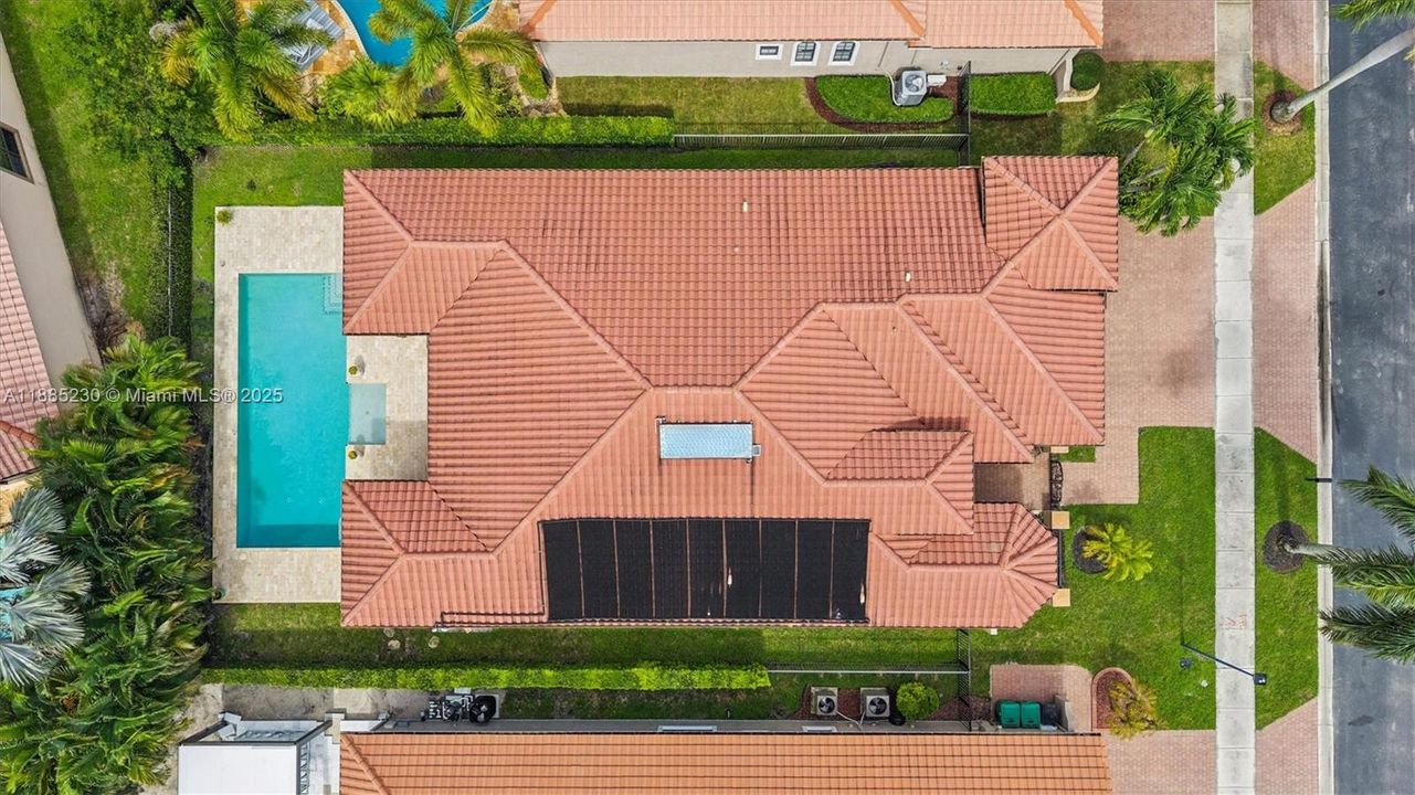 Aerial view highlighting this home’s enviable position within the exclusive gated enclave