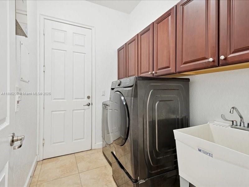 Well-appointed indoor laundry area designed for everyday convenience