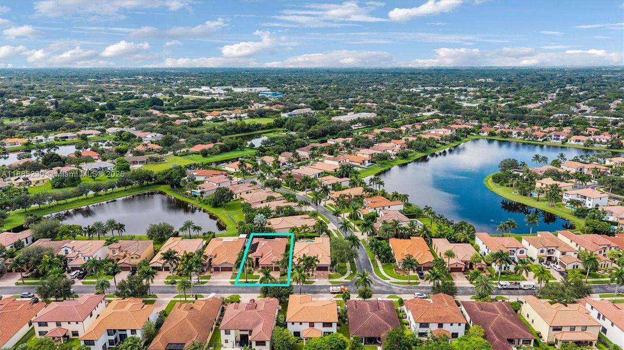 Bird’s-eye perspective revealing the property’s enviable position within the gated enclave.