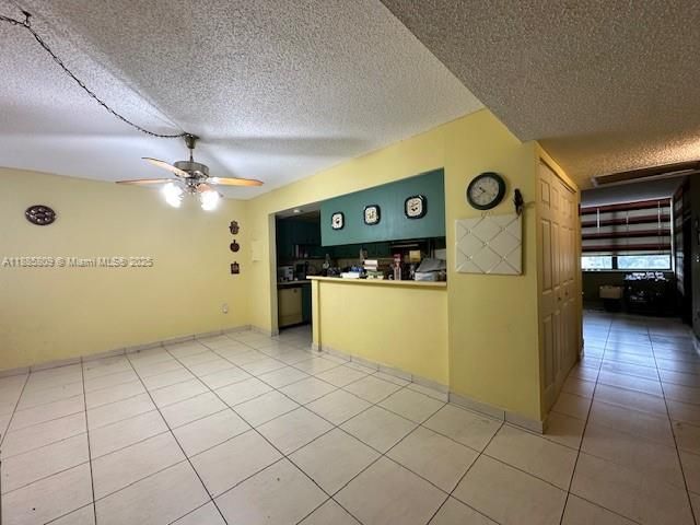 Enter into a dining area and kitchen that can be easily opened up.
