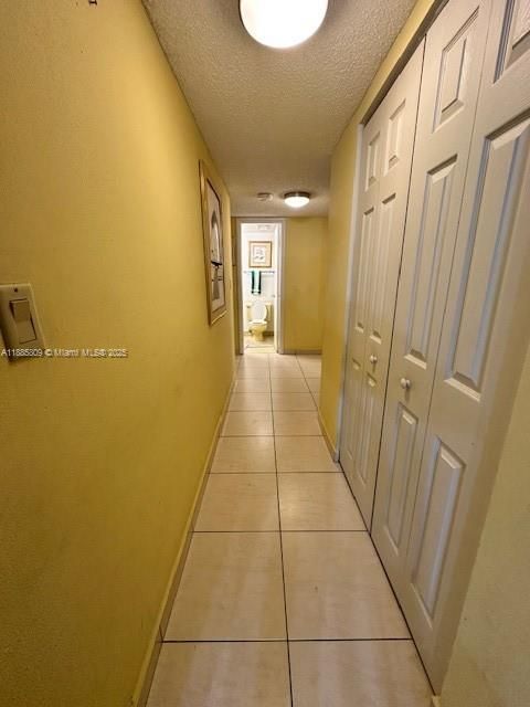 Hallway to bedrooms and bathrooms