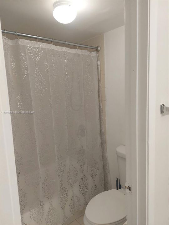 MASTER BATHROOM TUB AND SHOWER COMBO