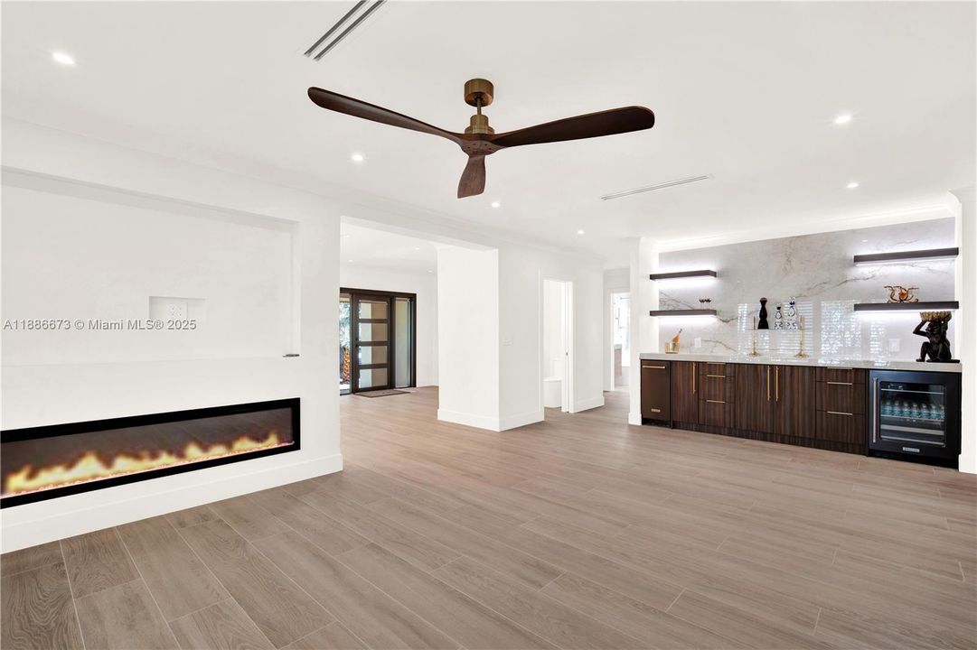 family room with custom bar