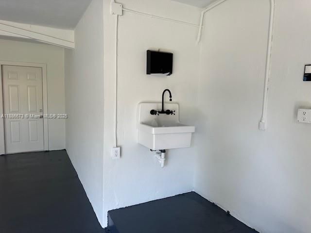 Garage with porcelain sink