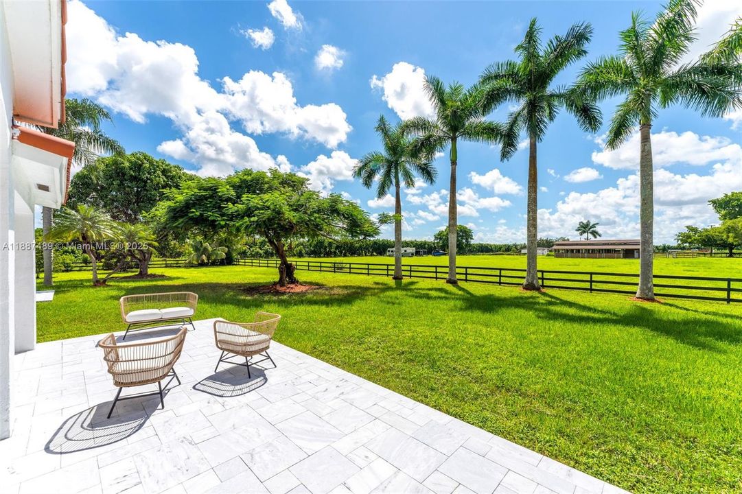 CROSS FENCING  SEPERATES HOME AND STABLES... ROOM FOR POOL PLUS 2ND HOME(GUEST)