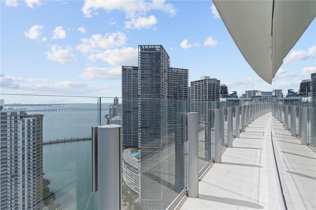 Wraparound balcony by Living and Dining Area.