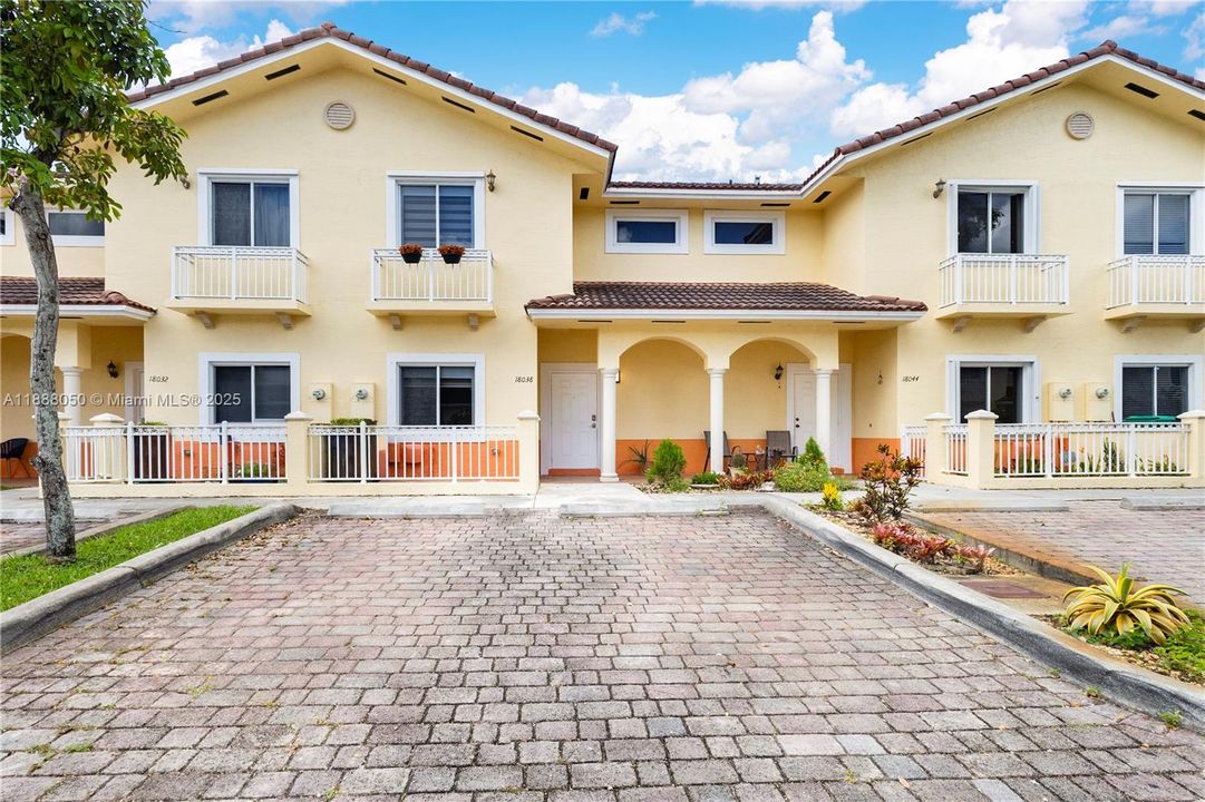 Front of property with two parking spaces