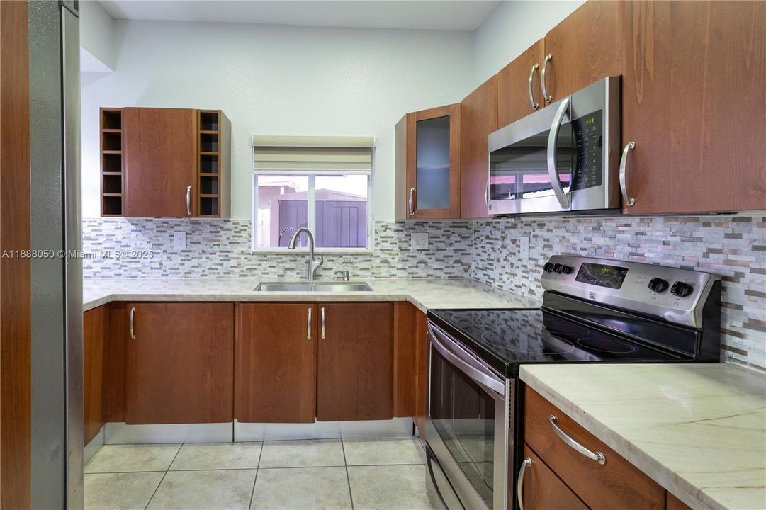 Bright and well equipped kitchen