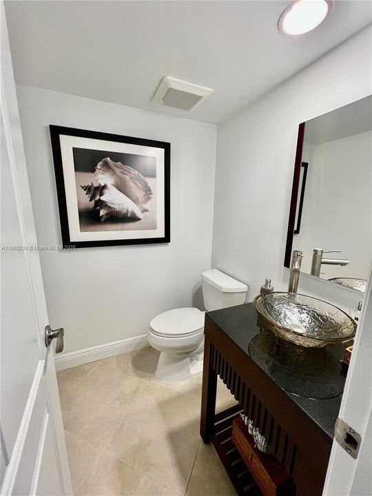 A complete view into the half bath room.