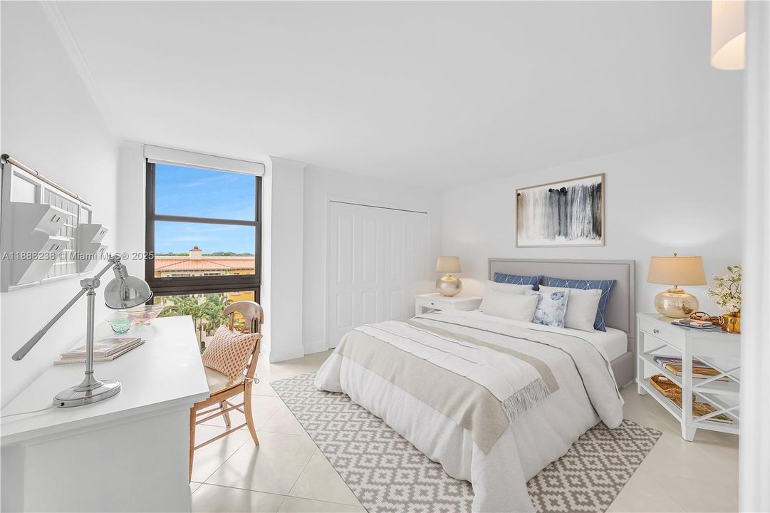 A view of the second bedroom. Just note that the bed, nightstand with lamp, carpet and picture have been virtually staged.