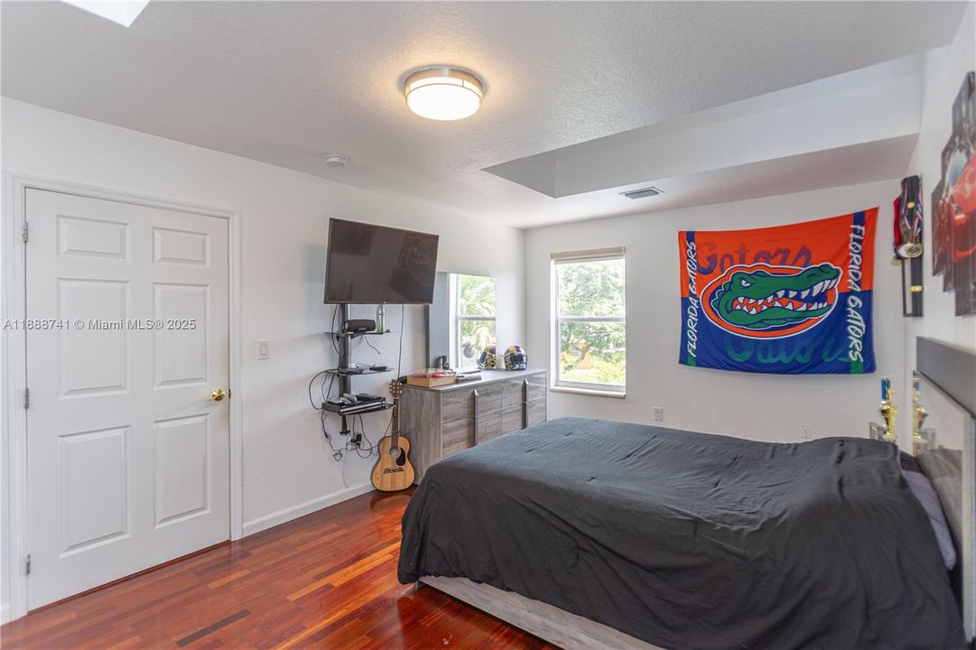 2nd Floor Bedroom 1 with view to the pool.