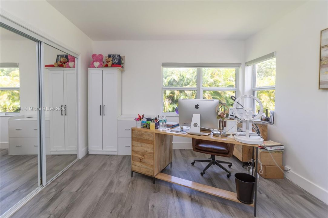Ground level Bedroom 4 with view to the backyard.