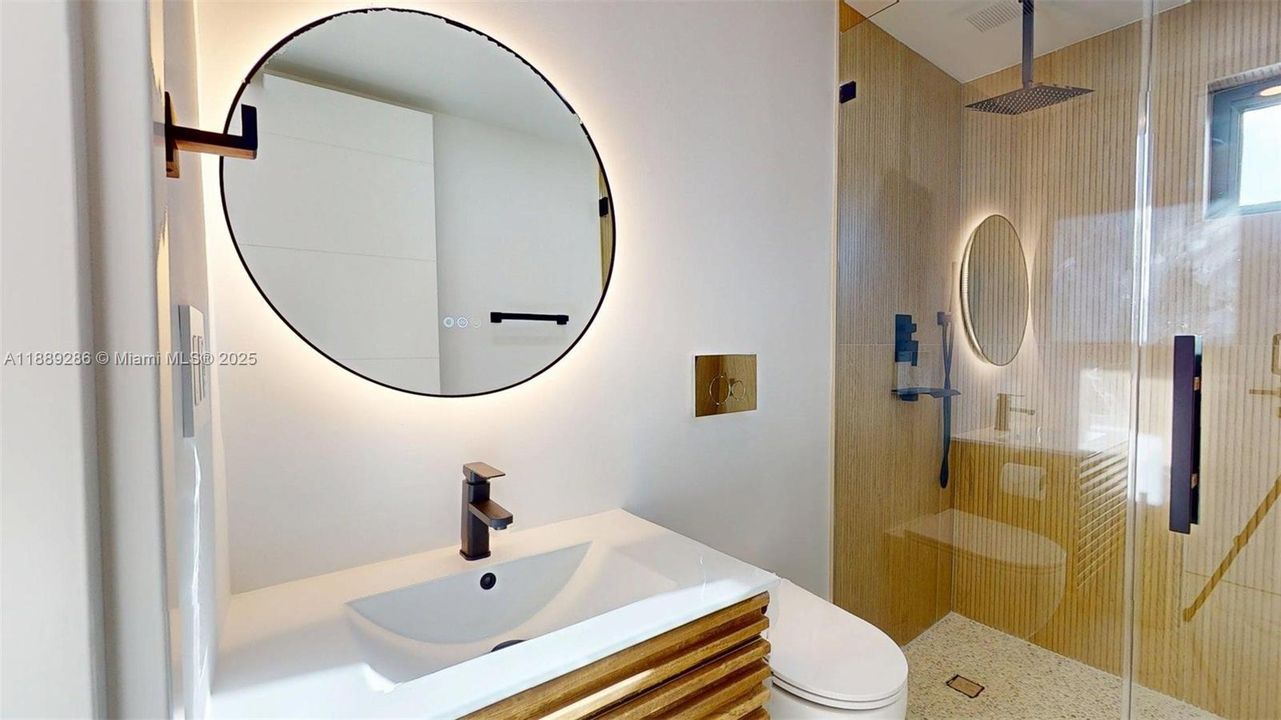 Bathroom of 2nd Bedroom with private entrance, yard and bathroom.