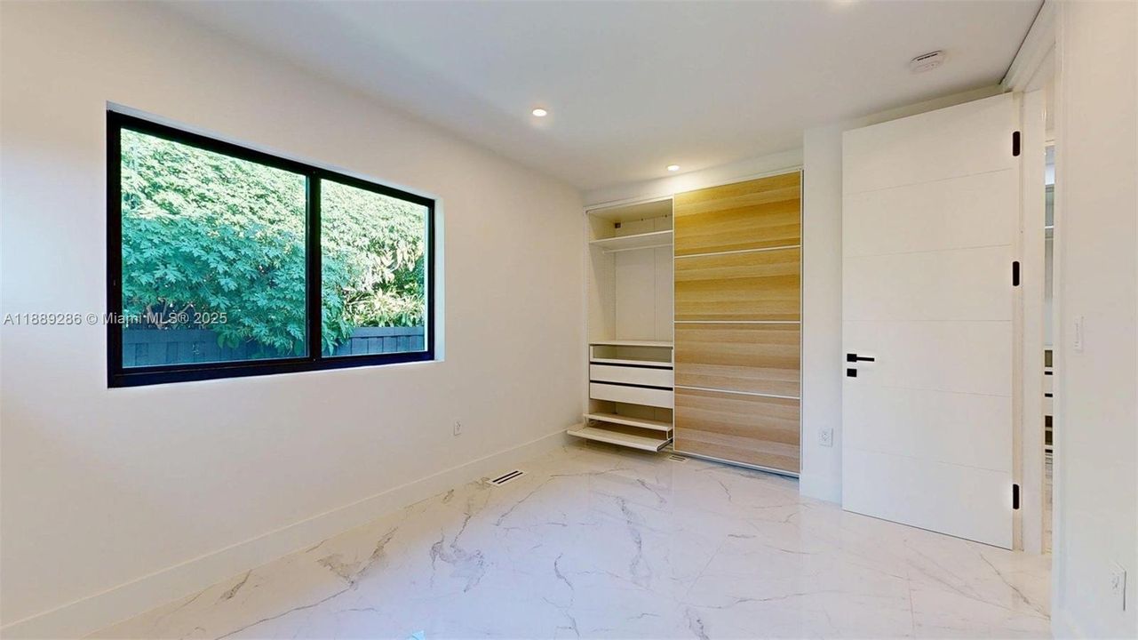 3rd Bedroom, NE Corner of the house, by the backyard deck